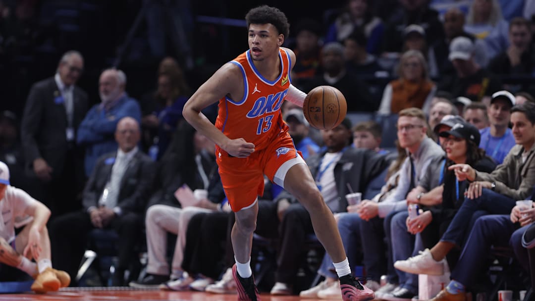Dec 10, 2025; Oklahoma City, Oklahoma, USA; Oklahoma City Thunder forward Ousmane Dieng (13) dribbles the ball down the court against the Phoenix Suns during the second half at Paycom Center. Mandatory Credit: Alonzo Adams-Imagn Images Dec 10, 2025; Oklahoma City, Oklahoma, USA; Oklahoma City Thunder forward Ousmane Dieng (13) dribbles the ball down the court against the Phoenix Suns during the second half at Paycom Center. Mandatory Credit: Alonzo Adams-Imagn Images