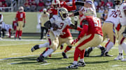 Jun 8, 2025; Birmingham, AL, USA; Michigan Panthers quarterback Bryce Perkins (3) runs the ball against Birmingham Stallions defensive lineman Willie Yarbary (97) during the second half of the USFL conference championship football game at Protective Stadium. Mandatory Credit: Vasha Hunt-Imagn Images