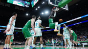 Apr 12, 2024; Boston, Massachusetts, USA; Boston Celtics center Neemias Queta (88) makes the basket against the Charlotte Hornets in the second quarter at TD Garden. Mandatory Credit: David Butler II-USA TODAY Sports