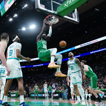 Apr 12, 2024; Boston, Massachusetts, USA; Boston Celtics center Neemias Queta (88) makes the basket against the Charlotte Hornets in the second quarter at TD Garden. Mandatory Credit: David Butler II-USA TODAY Sports