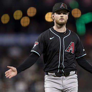 Sep 3, 2024; San Francisco, California, USA;  Arizona Diamondbacks starting pitcher Ryne Nelson (19) gestures as he walks off the field after throwing against the San Francisco Giants during the fourth inning at Oracle Park. Mandatory Credit: John Hefti-Imagn Images