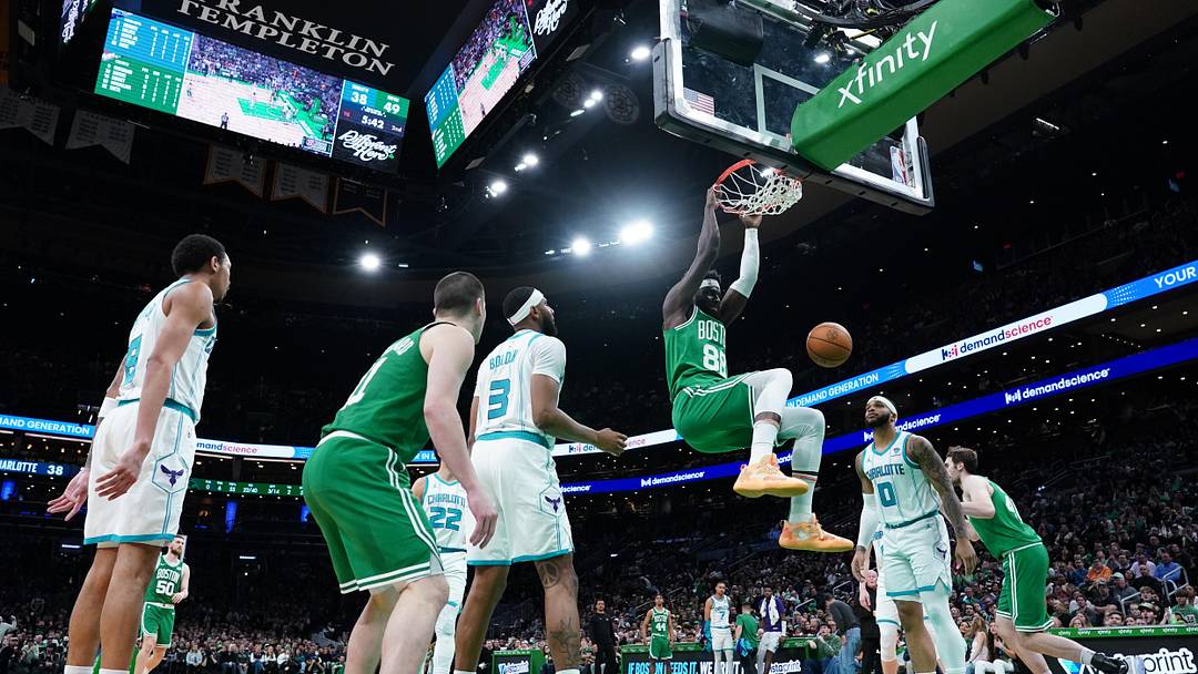 Apr 12, 2024; Boston, Massachusetts, USA; Boston Celtics center Neemias Queta (88) makes the basket.