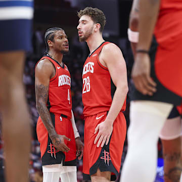 Feb 21, 2025; Houston, Texas, USA; Houston Rockets guard Jalen Green (4) talks with center Alperen Sengun (28) after a play during the third quarter against the Minnesota Timberwolves at Toyota Center. Mandatory Credit: Troy Taormina-Imagn Images