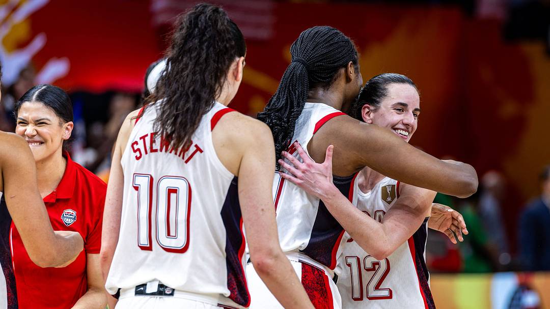 Caitlin Clark hugs her Team USA teammate after winning the FIBA World Cup. Caitlin Clark hugs her Team USA teammate after winning the FIBA World Cup.