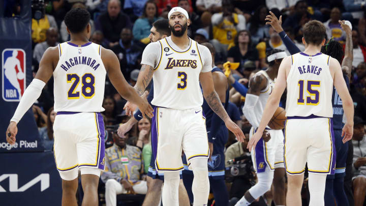 Apr 16, 2023; Memphis, Tennessee, USA; Los Angeles Lakers forward Anthony Davis (3) reacts with forward Rui Hachimura (28) and guard Austin Reaves (15) during the second half during game one of the 2023 NBA playoffs against the Memphis Grizzlies at FedExForum. Mandatory Credit: Petre Thomas-USA TODAY Sports