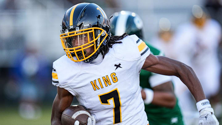 Detroit King wide receiver Damon Stennis (7) makes a catch against Cass Tech during the first half at Cass Tech High School in Detroit on Friday, Sept. 20, 2024.