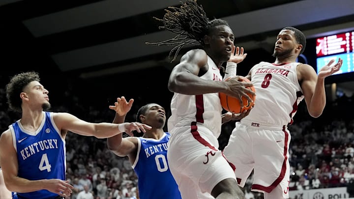 Feb 22, 2025; Tuscaloosa, AL, USA;  Alabama center Clifford Omoruyi (11) and Alabama guard Chris Youngblood (8) rebound against Kentucky guard Koby Brea (4) and Kentucky guard Otega Oweh (0) at Coleman Coliseum. Mandatory Credit: Gary Cosby Jr. USA TODAY Network via IMAGN IMAGES