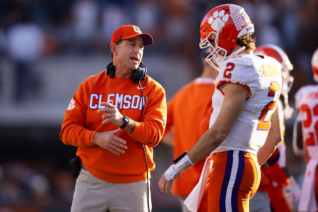 Clemson Tigers head coach Dabo Swinney with quarterback Cade Klubnik