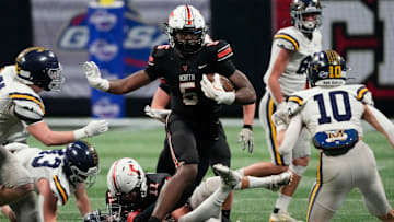 North Oconee's Khamari Brooks (5) moves the rock during the GHSA Division 4A Football State Championship game in Atlanta, on Monday, Dec. 16, 2024.