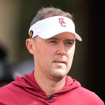 Sep 10, 2022; Stanford, California, USA;  USC Trojans head coach Lincoln Riley walks out of the tunnel for warmups before the start of the first quarter against the Stanford Cardinal at Stanford Stadium. Mandatory Credit: Stan Szeto-Imagn Images