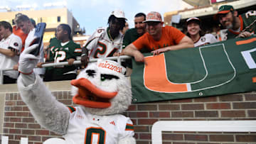 Oct 4, 2025; Tallahassee, Florida, USA; Miami Hurricanes mascot takes selfies with fans before a game against the Florida State Seminoles at Doak S. Campbell Stadium. Mandatory Credit: Melina Myers-Imagn Images