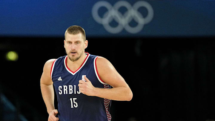 Aug 10, 2024; Paris, France; Serbia power forward Nikola Jokic (15) runs up the court against Germany in the men's basketball bronze medal game during the Paris 2024 Olympic Summer Games at Accor Arena. Mandatory Credit: Kyle Terada-Imagn Images