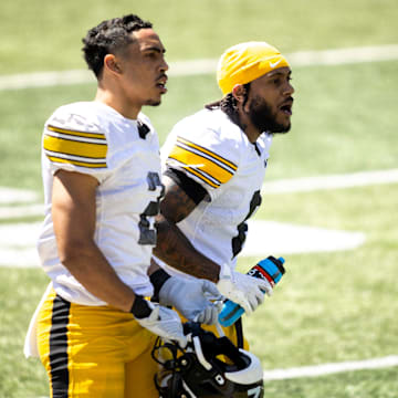 Apr 26, 2025; Iowa City, IA, USA; Iowa defensive backs TJ Hall (2) and Deshaun Lee (8) react during a spring NCAA football open practice at Kinnick Stadium. Mandatory Credit: Joseph Cress/For the Register