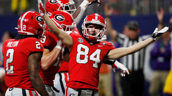 Georgia wide receiver Ladd McConkey (84) celebrates after scoring a touchdown during the first half of the SEC Championship NCAA college football game between LSU and Georgia in Atlanta, on Saturday, Dec. 3, 2022.

News Joshua L Jones