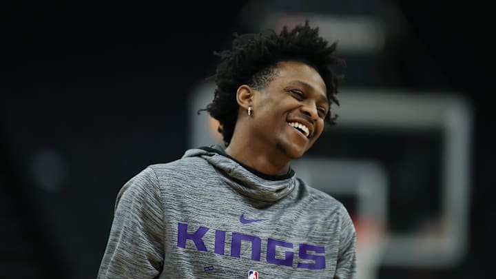 Feb 2, 2019; Sacramento, CA, USA; Sacramento Kings guard De'Aaron Fox (5) laughs during warm ups before the game against the Philadelphia 76ers at Golden 1 Center. Mandatory Credit: Sergio Estrada-Imagn Images
