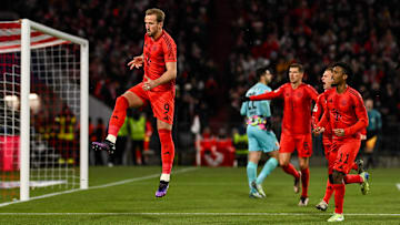 Harry Kane celebrating with teammates after scoring for Bayern Munich against Augsburg on Friday.