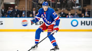 Mar 22, 2025; New York, New York, USA; New York Rangers center Matt Rempe (73) skates against the Vancouver Canucks during the second period at Madison Square Garden. Mandatory Credit: Danny Wild-Imagn Images