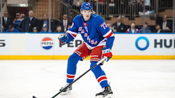 Mar 22, 2025; New York, New York, USA; New York Rangers center Matt Rempe (73) skates against the Vancouver Canucks during the second period at Madison Square Garden. Mandatory Credit: Danny Wild-Imagn Images
