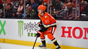 Oct 16, 2024; Anaheim, California, USA; Anaheim Ducks center Trevor Zegras (11) controls the puck against Utah Hockey Club during the second period at Honda Center. Mandatory Credit: Gary A. Vasquez-Imagn Images