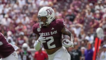 Sep 6, 2025; College Station, Texas, USA; Texas A&M Aggies wide receiver Terry Bussey (2) runs with the football during the second half against the Utah State Aggies at Kyle Field. Mandatory Credit: Sean Thomas-Imagn Images