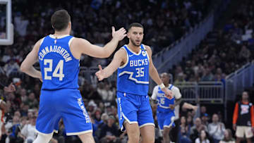 Milwaukee Bucks forward Pete Nance celebrates with Milwaukee Bucks guard Pat Connaughton after making a three point shot against the Detroit Pistons at Fiserv Forum on Sunday.