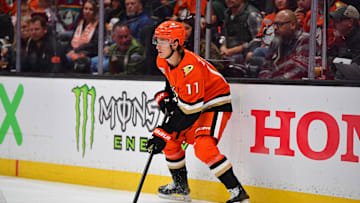 Oct 16, 2024; Anaheim, California, USA; Anaheim Ducks center Trevor Zegras (11) controls the puck against Utah Hockey Club during the second period at Honda Center. Mandatory Credit: Gary A. Vasquez-Imagn Images