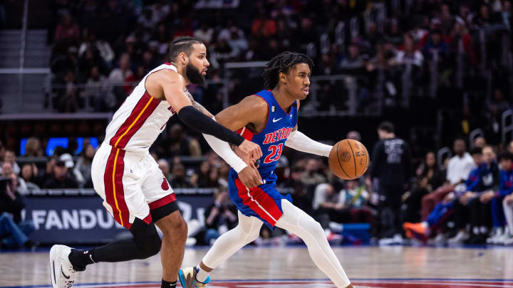 Mar 19, 2023; Detroit, Michigan, USA; Detroit Pistons guard Jaden Ivey (23) drives to the basket against Miami Heat forward Caleb Martin (16) in the second half at Little Caesars Arena. Mandatory Credit: Allison Farrand-USA TODAY Sports