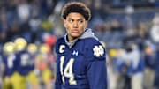 Oct 30, 2021; South Bend, Indiana, USA; Notre Dame Fighting Irish safety Kyle Hamilton (14) watches warm ups before the game against the North Carolina Tar Heels at Notre Dame Stadium. 