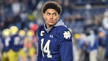 Oct 30, 2021; South Bend, Indiana, USA; Notre Dame Fighting Irish safety Kyle Hamilton (14) watches warm ups before the game against the North Carolina Tar Heels at Notre Dame Stadium. 