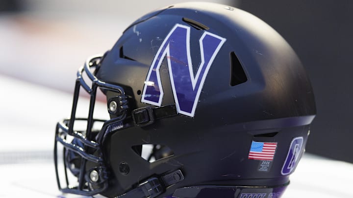 Nov 11, 2023; Madison, Wisconsin, USA; General view of a Northwestern Wildcats helmet on the sidelines during the game against the Wisconsin Badgers at Camp Randall Stadium. Mandatory Credit: Jeff Hanisch-Imagn Images Nov 11, 2023; Madison, Wisconsin, USA; General view of a Northwestern Wildcats helmet on the sidelines during the game against the Wisconsin Badgers at Camp Randall Stadium. Mandatory Credit: Jeff Hanisch-Imagn Images