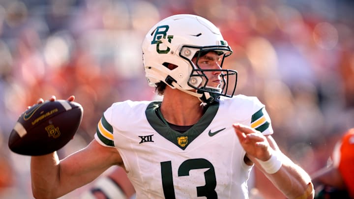 Baylor's Sawyer Robertson (13) throws a pass in the second half of the college football game between the Oklahoma State Cowboys and the Baylor Bears at Boone Pickens Stadium in Stillwater, Okla., Saturday, Sept. 27, 2025.