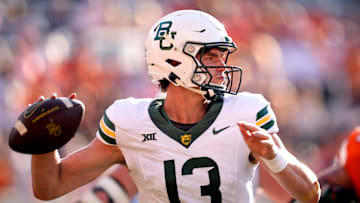 Baylor's Sawyer Robertson (13) throws a pass in the second half of the college football game between the Oklahoma State Cowboys and the Baylor Bears at Boone Pickens Stadium in Stillwater, Okla., Saturday, Sept. 27, 2025.