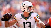 Baylor's Sawyer Robertson (13) throws a pass in the second half of the college football game between the Oklahoma State Cowboys and the Baylor Bears at Boone Pickens Stadium in Stillwater, Okla., Saturday, Sept. 27, 2025.