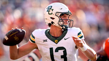 Baylor's Sawyer Robertson (13) throws a pass in the second half of the college football game between the Oklahoma State Cowboys and the Baylor Bears at Boone Pickens Stadium in Stillwater, Okla., Saturday, Sept. 27, 2025.