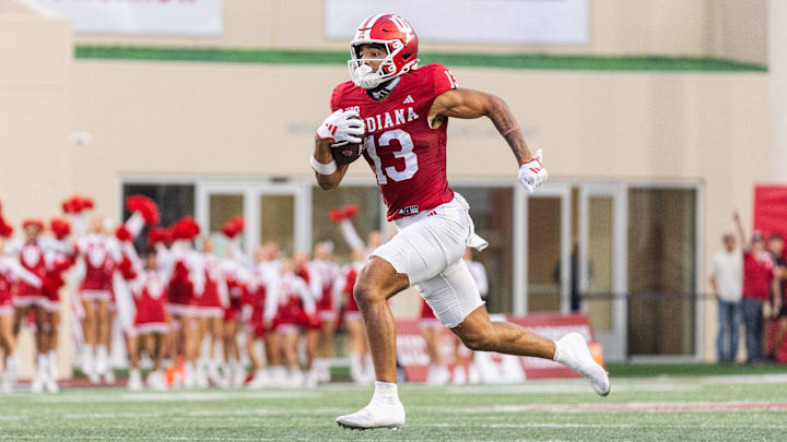 Indiana Hoosiers wide receiver Elijah Sarratt (13) runs for a 71-yard touchdown against the Western Illinois Leathernecks at Memorial Stadium.