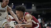 Alabama Crimson Tide guard Mark Sears (1) controls the ball against Purdue Boilermakers forward Mason Gillis (0) last year. 