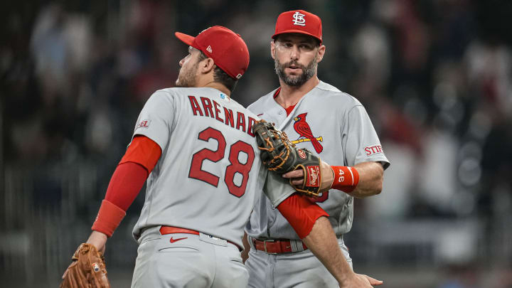 Sep 6, 2023; Cumberland, Georgia, USA; St. Louis Cardinals third baseman Nolan Arenado (28) and first baseman Paul Goldschmidt (46)  react after defeating the Atlanta Braves at Truist Park. Mandatory Credit: Dale Zanine-USA TODAY Sports