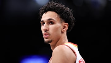 Zaccharie Risacher #10 of the Atlanta Hawks looks on against the Brooklyn Nets.