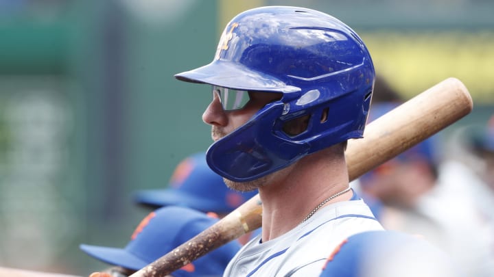 Jul 7, 2024; Pittsburgh, Pennsylvania, USA;  New York Mets first baseman Pete Alonso (20) waits on the dugout steps to bat against the Pittsburgh Pirates during the ninth inning at PNC Park. The Mets won 3-2. Mandatory Credit: Charles LeClaire-USA TODAY Sports