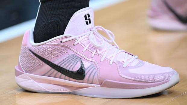 Pink and black Nike sneakers.