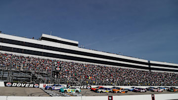 Apr 28, 2024; Dover, Delaware, USA; NASCAR Cup Series driver Kyle Larson (5) leads the field on a restart during the Wurth 400 at Dover Motor Speedway. Mandatory Credit: Matthew O'Haren-Imagn Images
