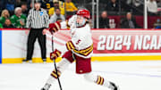 Apr 11, 2024; Saint Paul, Minnesota, USA; Boston College Eagles defenseman Drew Fortescue (5) shoots in the semifinals of the 2024 Frozen Four college ice hockey tournament during the second period against the Michigan Wolverines at Xcel Energy Center. Mandatory Credit: Brace Hemmelgarn-Imagn Images