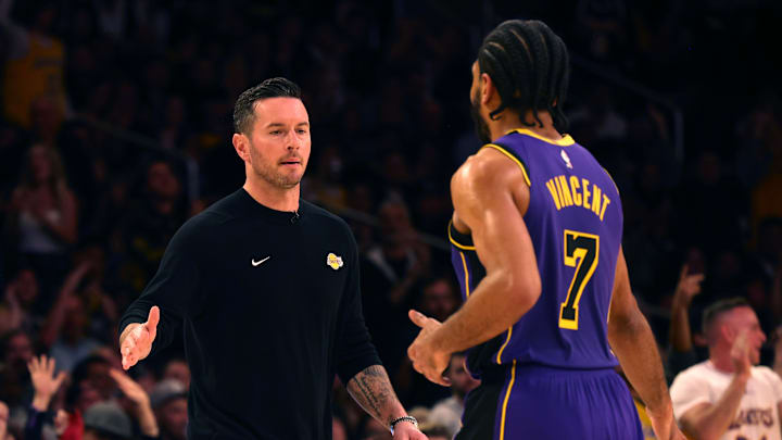 JJ Redick and Gabe Vincent celebrate during the fourth quarter. 