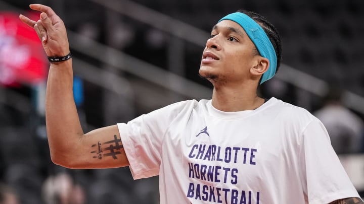 Apr 10, 2024; Atlanta, Georgia, USA; Charlotte Hornets guard Tre Mann (23) shown on the court prior to the game against the Atlanta Hawks at State Farm Arena. Mandatory Credit: Dale Zanine-USA TODAY Sports