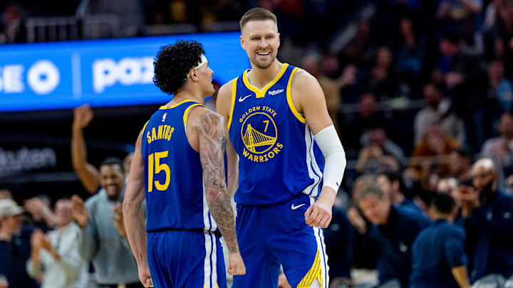 Mar 10, 2026; San Francisco, California, USA; Golden State Warriors center Kristaps Porzingis (7) and Golden State Warriors forward Gui Santos (15) celebrate during the third quarter against the Chicago Bulls at Chase Center. Mandatory Credit: Bob Kupbens-Imagn Images