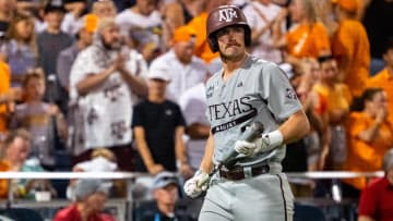 Jun 24, 2024; Omaha, NE, USA; Texas A&M Aggies designated hitter Hayden Schott (5) walks off after striking out against the Tennessee Volunteers during the ninth inning at Charles Schwab Field Omaha. 