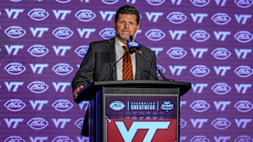 Jul 23, 2024; Charlotte, NC, USA; Virginia Tech head coach Brent Pry answers questions from the media during the ACC Kickoff at Hilton Charlotte Uptown. Mandatory Credit: Jim Dedmon-Imagn Images