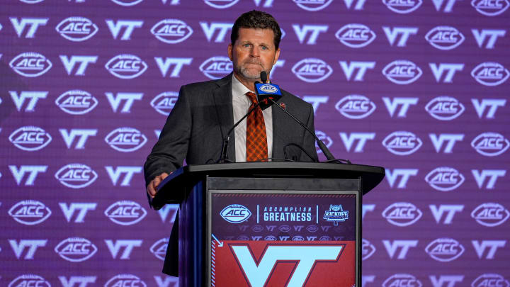 Jul 23, 2024; Charlotte, NC, USA; Virginia Tech head coach Brent Pry answers questions from the media during the ACC Kickoff at Hilton Charlotte Uptown. Mandatory Credit: Jim Dedmon-USA TODAY Sports