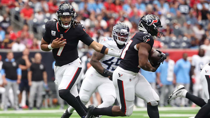 Sep 28, 2025; Houston, Texas, USA; Houston Texans quarterback CJ. Stroud (7) hands off to running back Nick Chubb (21) during the first half against the Tennessee Titans at NRG Stadium. Mandatory Credit: Troy Taormina-Imagn Images Sep 28, 2025; Houston, Texas, USA; Houston Texans quarterback CJ. Stroud (7) hands off to running back Nick Chubb (21) during the first half against the Tennessee Titans at NRG Stadium. Mandatory Credit: Troy Taormina-Imagn Images