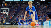 Mar 22, 2025; Lexington, KY, USA;  Creighton Bluejays forward Jackson McAndrew (23) picks up a loose ball during the first half against the Auburn Tigers in the second round to the NCAA Tournament at Rupp Arena.